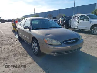 2003 Ford Taurus SES Standard with VIN 1FAFP55203A182168, listed as a IAAI auction lot 41227090 with 179,005 mi miles and . Bid and sale history available at carsss.com. Image 1.
