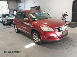 2011 Volkswagen Tiguan S with VIN WVGAV7AX4BW001335, listed as a IAAI auction lot 42610885 with 122,812 mi miles and . Bid and sale history available at DreamBid. Image 1.