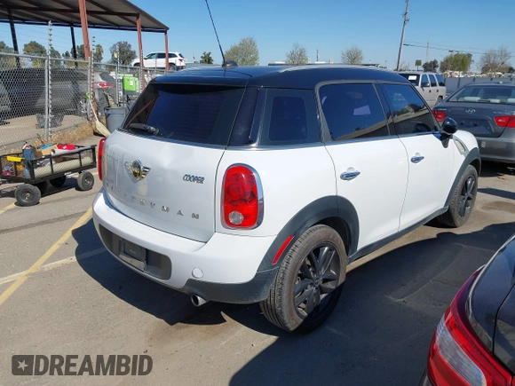 2015 MINI Countryman with VIN WMWZB3C51FWR45357, listed as a IAAI auction lot 41871831 with 201,358 mi miles and . Bid and sale history available at DreamBid. Image 4.