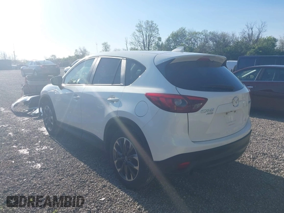 2016 Mazda CX-5 Grand Touring with VIN JM3KE4DY1G0680431, listed as a IAAI auction lot 42136637 with 166,348 mi miles. Bid and sale history available at carsss.com. Image 3.