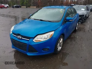 2014 Ford Focus SE with VIN 1FADP3F28EL193582, listed as a IAAI auction lot 41866782 with 166,733 mi miles. Bid and sale history available at carsss.com. Image 2.