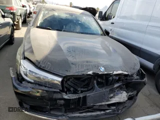 2016 BMW 7 Series 740i with VIN WBA7E2C56GG547453, listed as a Copart auction lot 67875632 with 92,588 mi miles. Bid and sale history available at carsss.com. Image 5.