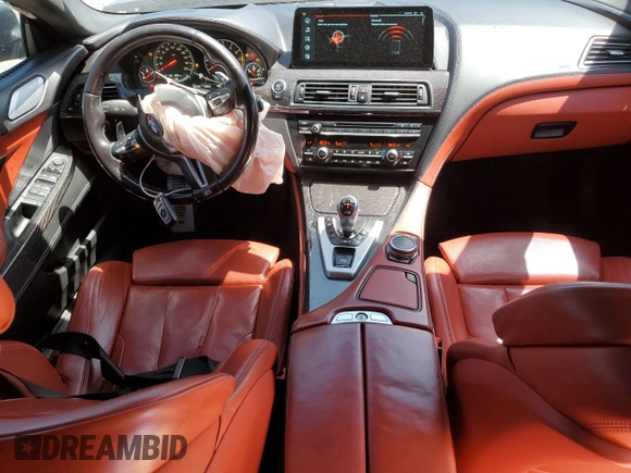 2016 BMW M6 with VIN WBS6E9C5XGG437084, listed as a Copart auction lot 53632315 with 108,151 mi miles and Salvage title. Bid and sale history available at DreamBid. Image 8.
