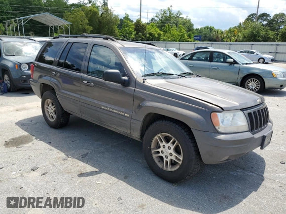 1999 Jeep Grand Cherokee Limited with VIN 1J4GW68S6XC713297, listed as a Copart auction lot 55264384 with 98,912 mi miles and Salvage Title. Bid and sale history available at carsss.com. Image 4.