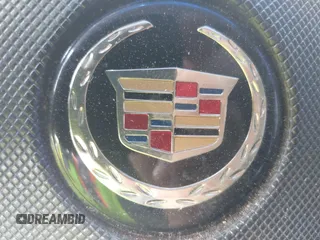 2006 Cadillac CTS z VIN 1G6DP577560184909, wystawiony jako IAAI lot #42153050 z przebiegiem 234 316 mil mil oraz . Historia ofert i sprzedaży dostępna na DreamBid. Obrazek 12.