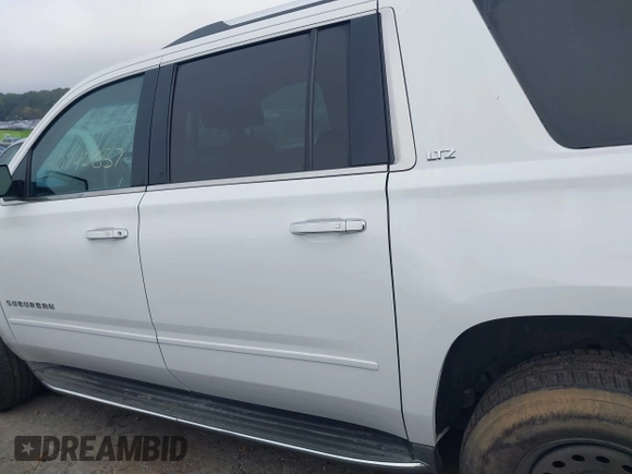 2016 Chevrolet Suburban LTZ with VIN 1GNSCJKC2GR111370, listed as a IAAI auction lot 40742857 with 199,753 mi miles and . Bid and sale history available at DreamBid. Image 14.