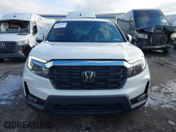 2023 Honda Passport EX-L with VIN 5FNYF8H50PB041370, listed as a IAAI auction lot 41536255 with 15,427 mi miles and . Bid and sale history available at carsss.com. Image 12.