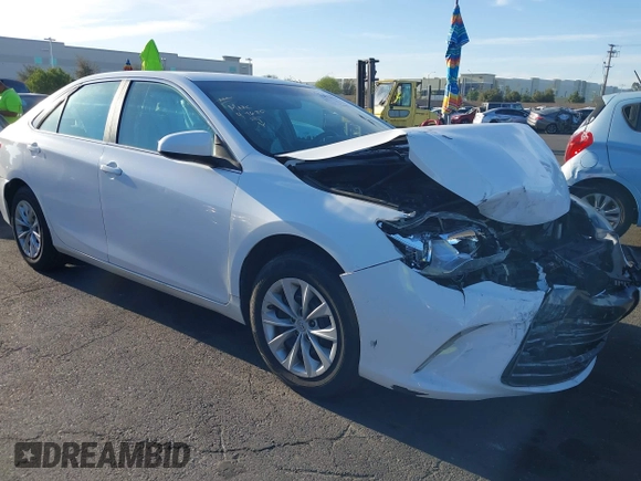 2015 Toyota Camry XLE with VIN 4T1BF1FK9FU923208, listed as a IAAI auction lot 42076970 with 124,096 mi miles and . Bid and sale history available at carsss.com. Image 1.
