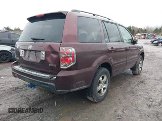 2007 Honda Pilot EX-L with VIN 2HKYF18557H535426, listed as a IAAI auction lot 41126160 with 169,336 mi miles. Bid and sale history available at carsss.com. Image 4.
