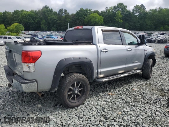 2012 Toyota Tundra Limited with VIN 5TFHW5F18CX233781, listed as a Copart auction lot 57956925 with 208,629 mi miles and Salvage title. Bid and sale history available at DreamBid. Image 3.