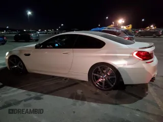 2017 BMW M6 z VIN WBS6J9C56HD934812, wystawiony jako Copart lot #44018915 z przebiegiem 84 409 mil mil oraz Szkoda całkowita • Salvage title. Historia ofert i sprzedaży dostępna na DreamBid. Obrazek 2.