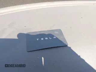 2020 Tesla Model 3 Standard Range Plus z VIN 5YJ3E1EA6LF659311, wystawiony jako IAAI lot #42363341 z przebiegiem 96 378 mil mil oraz . Historia ofert i sprzedaży dostępna na DreamBid. Obrazek 11.