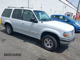 1998 Ford Explorer XL z VIN 1FMZU34E1WZA43815, wystawiony jako IAAI lot #42446208 z przebiegiem 71 990 mil mil oraz . Historia ofert i sprzedaży dostępna na DreamBid. Obrazek 1.