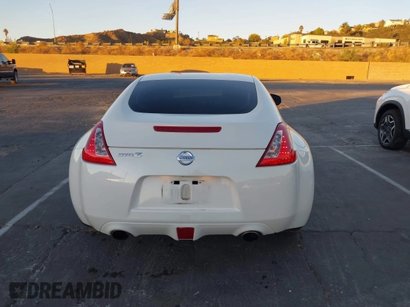2014 Nissan 370Z Touring с VIN JN1AZ4EH2EM635420, выставлен на аукционе IAAI как лот 40862653 с пробегом 68 004 миль миль и . История ставок и продаж доступна на DreamBid. Изображение 16.