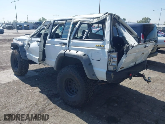1991 Jeep Cherokee Country z VIN 1J4FJ78S7ML632675, wystawiony jako IAAI lot #42283175 z przebiegiem 116 062 mil mil oraz . Historia ofert i sprzedaży dostępna na DreamBid. Obrazek 3.