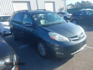 2010 Toyota Sienna XLE with VIN 5TDYK4CC7AS337726, listed as a IAAI auction lot 41904653 with 174,564 mi miles. Bid and sale history available at carsss.com. Image 1.
