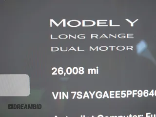 2023 Tesla Model Y Long Range with VIN 7SAYGAEE5PF964083, listed as a IAAI auction lot 41365919 with 26,008 mi miles and . Bid and sale history available at carsss.com. Image 16.