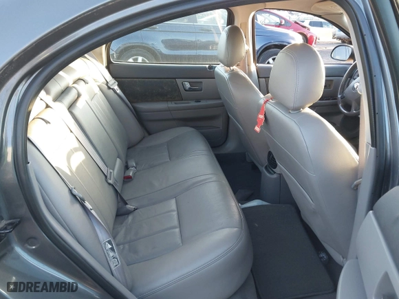2003 Mercury Sable LS Premium with VIN 1MEFM55S03G606625, listed as a IAAI auction lot 41070883 with 100,002 mi miles. Bid and sale history available at carsss.com. Image 8.