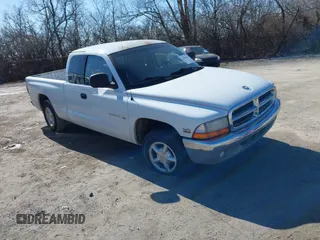 1997 Dodge Dakota z VIN 1B7GL23Y0VS158028, wystawiony jako IAAI lot #41761551 z przebiegiem 75 468 mil mil oraz . Historia ofert i sprzedaży dostępna na DreamBid. Obrazek 1.
