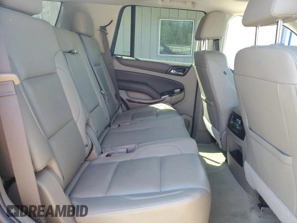 2017 Chevrolet Tahoe LT z VIN 1GNSKBKC5HR330558, wystawiony jako Copart lot #54977925 z przebiegiem 102 961 mil mil oraz Szkoda całkowita • Salvage title. Historia ofert i sprzedaży dostępna na DreamBid. Obrazek 11.