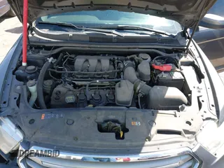 2013 Ford Taurus SEL with VIN 1FAHP2E81DG113242, listed as a IAAI auction lot 41952486 with 169,369 mi miles. Bid and sale history available at carsss.com. Image 10.
