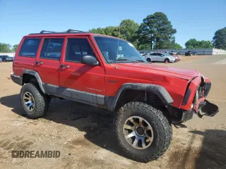 1998 Jeep Cherokee Sport with VIN 1J4FJ68S3WL167809, listed as a Copart auction lot 53829645 with Not provided miles and Salvage title. Bid and sale history available at DreamBid. Image 4.