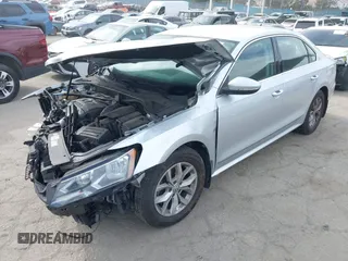 2016 Volkswagen Passat S with VIN 1VWAT7A32GC053916, listed as a IAAI auction lot 42288513 with 145,882 mi miles and . Bid and sale history available at DreamBid. Image 2.