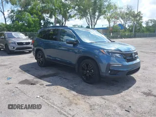 2021 Honda Pilot Special Edition with VIN 5FNYF5H25MB041980, listed as a IAAI auction lot 39597428 with 43,167 mi miles and . Bid and sale history available at carsss.com. Image 1.