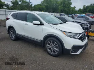 2020 Honda CR-V Touring z VIN 2HKRW2H90LH645727, wystawiony jako Copart lot #62077365 z przebiegiem 58 614 mil mil oraz Szkoda całkowita • Salvage title. Historia ofert i sprzedaży dostępna na DreamBid. Obrazek 4.