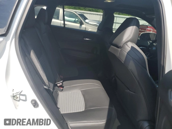 2023 Toyota Corolla Cross Hybrid S with VIN 7MUFBABG5PV008595, listed as a Copart auction lot 60002585 with 9,052 mi miles and Salvage title. Bid and sale history available at DreamBid. Image 11.