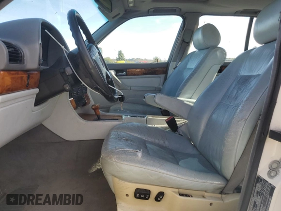1993 BMW 7 Series with VIN WBAGD4323PDE63700, listed as a Copart auction lot 79675024 with 248,056 mi miles and Clean title. Bid and sale history available at DreamBid. Image 7.
