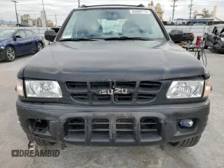 2001 Isuzu Rodeo S with VIN 4S2CK58W814333364, listed as a Copart auction lot 84656114 with 140,489 mi miles and Salvage title. Bid and sale history available at DreamBid. Image 5.
