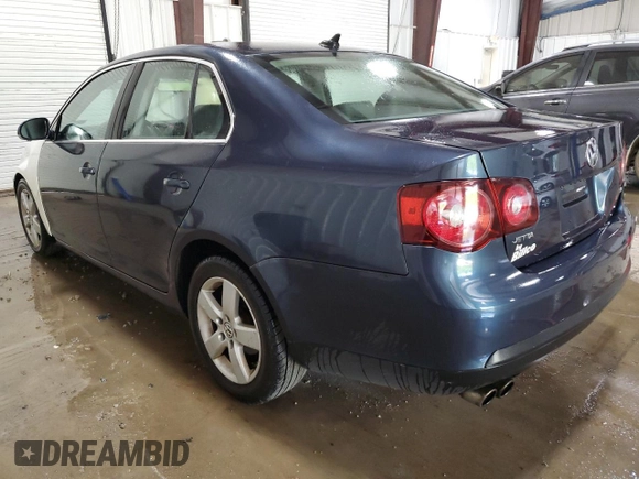 2009 Volkswagen Jetta SE z VIN 3VWRZ71K29M167800, wystawiony jako Copart lot #61451305 z przebiegiem 161 617 mil mil oraz Szkoda całkowita • Salvage title. Historia ofert i sprzedaży dostępna na DreamBid. Obrazek 2.