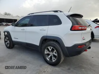 2014 Jeep Cherokee Trailhawk with VIN 1C4PJMBS3EW294676, listed as a Copart auction lot 47652335 with 161,663 mi miles and Salvage Title. Bid and sale history available at carsss.com. Image 2.