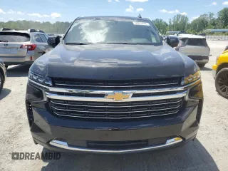 2021 Chevrolet Tahoe LT with VIN 1GNSKNKD4MR262628, listed as a Copart auction lot 54875235 with 90,533 mi miles and Salvage title. Bid and sale history available at DreamBid. Image 5.