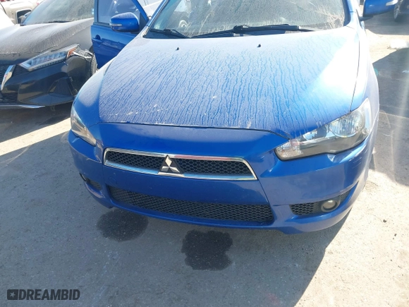 2015 Mitsubishi Lancer ES with VIN JA32U2FU0FU012412, listed as a IAAI auction lot 41766999 with 158,851 mi miles. Bid and sale history available at carsss.com. Image 6.