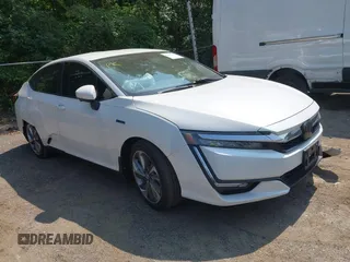 2018 Honda Clarity Touring z VIN JHMZC5F30JC022009, wystawiony jako IAAI lot #42416002 z przebiegiem 129 992 mil mil oraz . Historia ofert i sprzedaży dostępna na DreamBid. Obrazek 1.