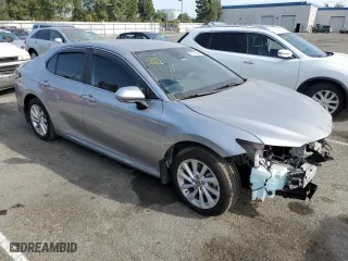 2024 Toyota Camry LE with VIN 4T1C11AK7RU898436, listed as a Copart auction lot 86216844 with 5,201 mi miles and Salvage Title. Bid and sale history available at carsss.com. Image 4.