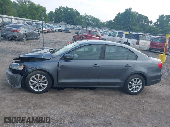 2011 Volkswagen Jetta SE with VIN 3VWDX7AJ5BM388532, listed as a IAAI auction lot 42453112 with 120,170 mi miles and . Bid and sale history available at DreamBid. Image 14.