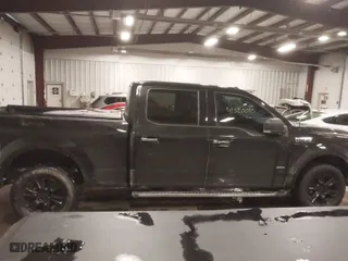 2015 Ford F-150 XLT w/HD Payload Pkg with VIN 1FTFW1EG8FFB59391, listed as a IAAI auction lot 41520010 with 119,414 mi miles. Bid and sale history available at carsss.com. Image 13.