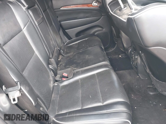 2011 Jeep Grand Cherokee Overland Summit with VIN 1J4RR6GT9BC586712, listed as a IAAI auction lot 42427655 with 157,549 mi miles and . Bid and sale history available at DreamBid. Image 8.
