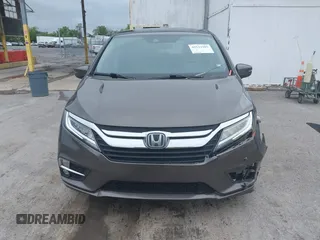 2018 Honda Odyssey Touring with VIN 5FNRL6H89JB057148, listed as a IAAI auction lot 42511909 with 166,438 mi miles and . Bid and sale history available at DreamBid. Image 12.