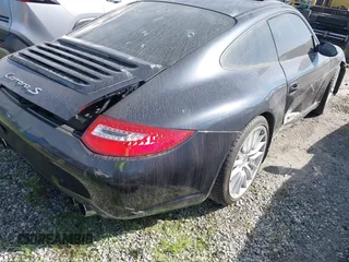 2006 Porsche 911 Carrera S with VIN WP0AB29986S740565, listed as a IAAI auction lot 41488077 with 81,471 mi miles. Bid and sale history available at carsss.com. Image 4.