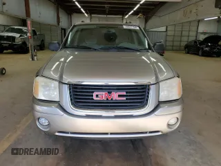 2005 GMC Envoy SLE with VIN 1GKDS13S352220344, listed as a Copart auction lot 70027194 with 234,427 mi miles and Salvage Title. Bid and sale history available at carsss.com. Image 5.