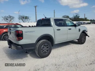 2024 Ford Ranger XLT with VIN 1FTER4GH7RLE74280, listed as a Copart auction lot 57282575 with 5,423 mi miles and Salvage title. Bid and sale history available at DreamBid. Image 3.