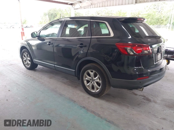 2014 Mazda CX-9 Touring with VIN JM3TB2CA2E0446267, listed as a IAAI auction lot 42196512 with 98,670 mi miles and . Bid and sale history available at carsss.com. Image 3.