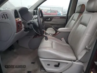 2007 GMC Envoy SLE with VIN 1GKDT13S372265140, listed as a Copart auction lot 84198914 with 256,650 mi miles and Salvage Title. Bid and sale history available at carsss.com. Image 7.