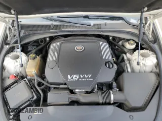 2014 Cadillac CTS Premium RWD z VIN 1G6AT5S30E0142990, wystawiony jako Copart lot #50801685 z przebiegiem 74 583 mil mil oraz Szkody całkowita. Historia ofert i sprzedaży dostępna na DreamBid. Obrazek 11.