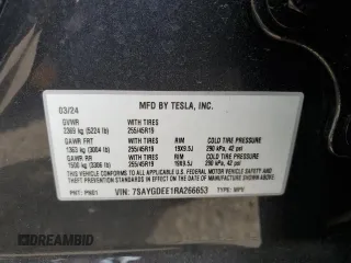 2024 Tesla Model Y Long Range with VIN 7SAYGDEE1RA266653, listed as a Copart auction lot 62277865 with 8,189 mi miles and Salvage title. Bid and sale history available at DreamBid. Image 13.