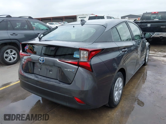 2022 Toyota Prius L Eco with VIN JTDKAMFU4N3183352, listed as a IAAI auction lot 42170623 with 52,244 mi miles and . Bid and sale history available at DreamBid. Image 4.